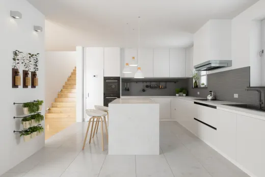 Kitchen with integrated appliances and new cabinetry after water-damaged units were replaced