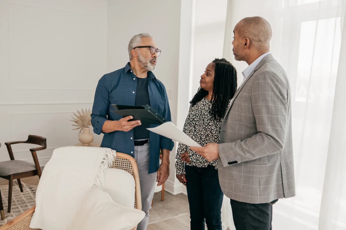 Final renovation walkthrough with homeowners and Leo Constra contractor reviewing completed project with warranty coverage in Toronto
